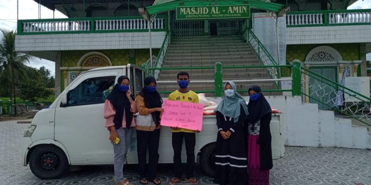 Bersama Perangi Corona, Remaja Masjid Al-Amin Piliang Lima Kaum Bagikan Hampir 1,5 Ton Beras